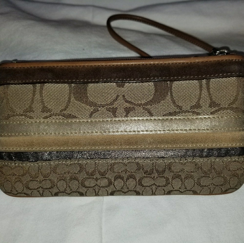 Coach wristlet signature gold stripe